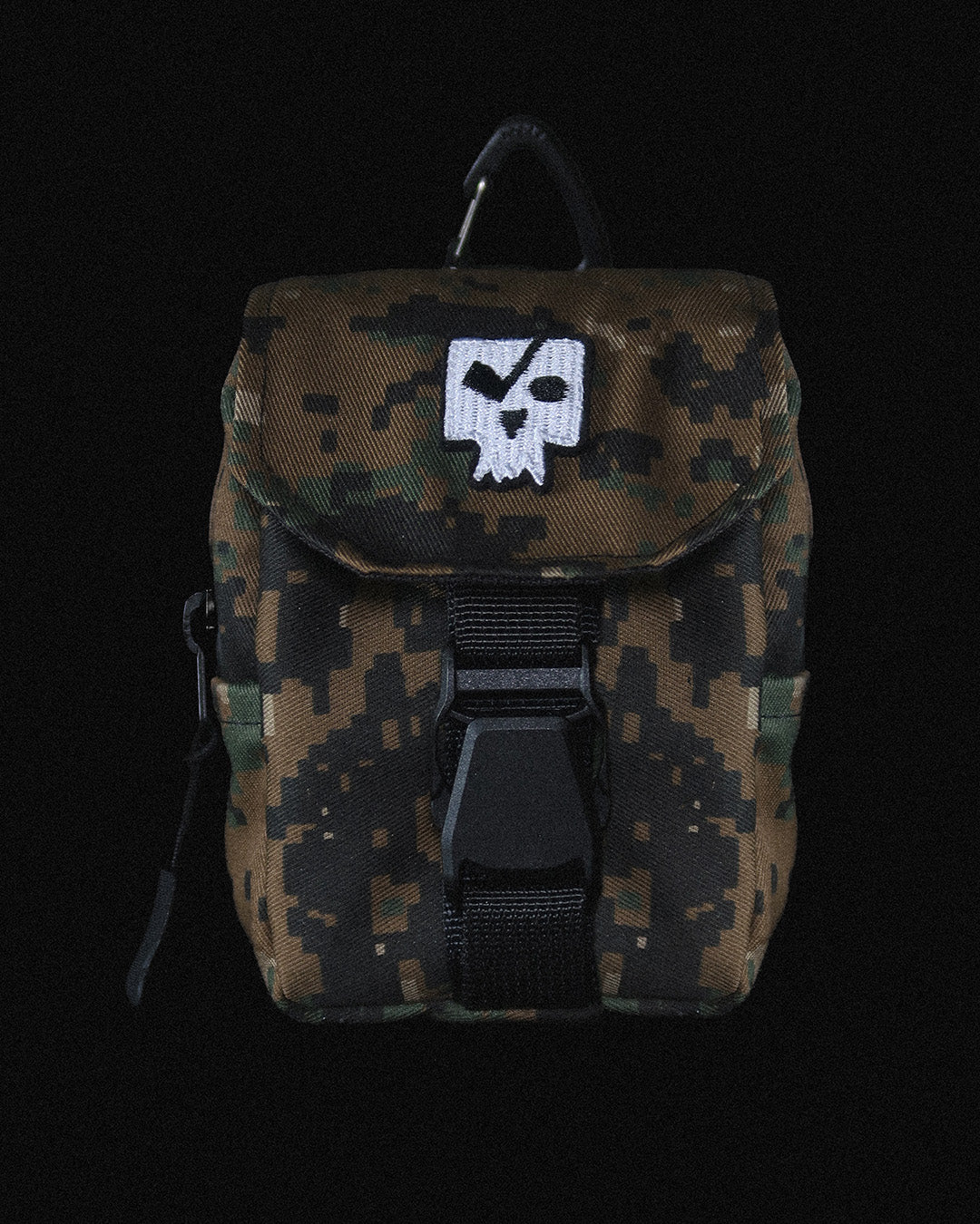 Camouflage backpack with a skull patch on a black background