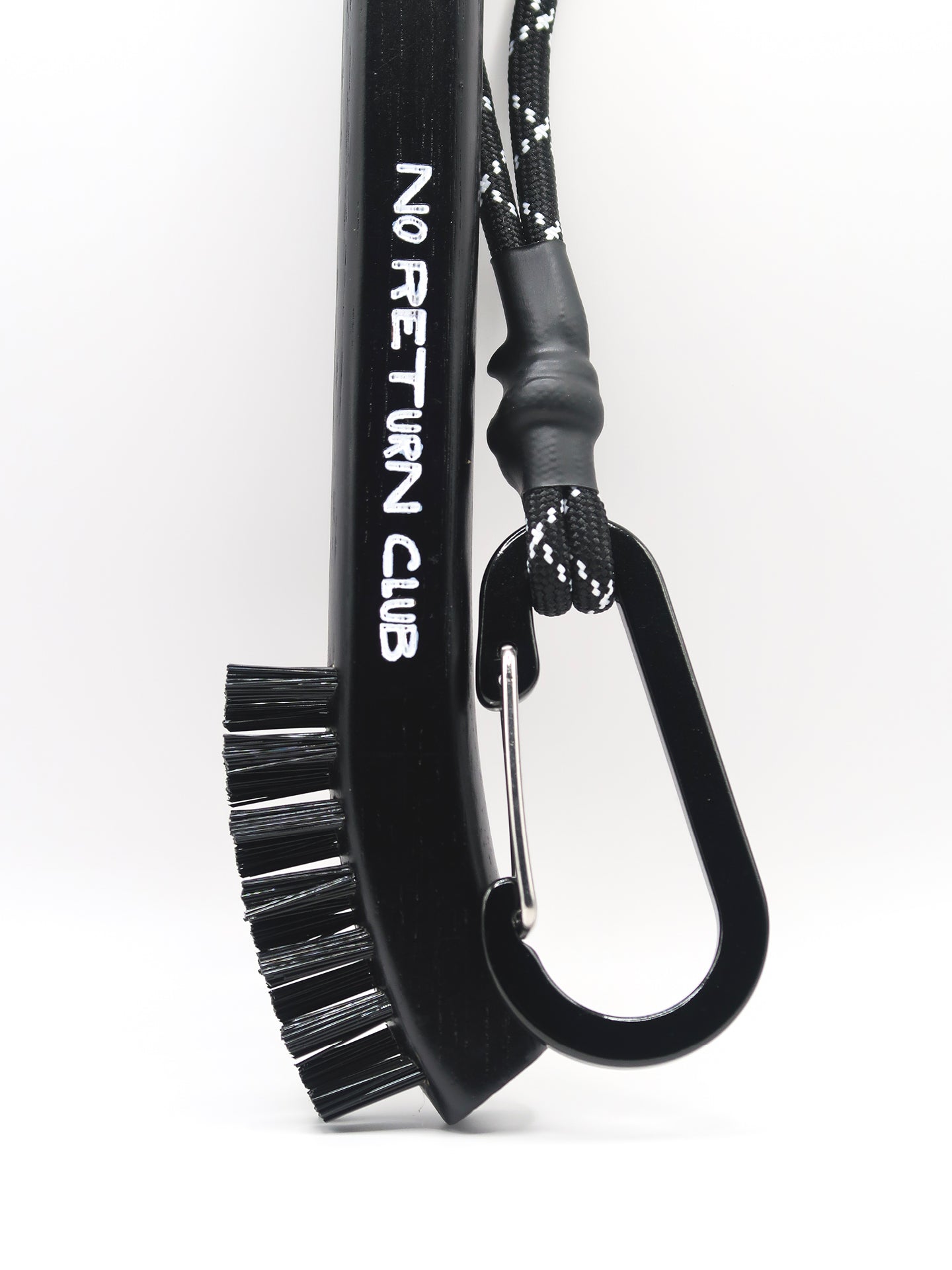 Close-up detail of the nylon bristles on the hickory golf club brush for cleaning club grooves.